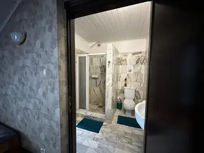 Łazienka w obiekcie Guest House Villa Arkadia