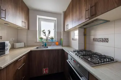 Kuchnia lub aneks kuchenny w obiekcie WSTApartments Salezego 6 Apartament z widokiem na Stadion Narodowy