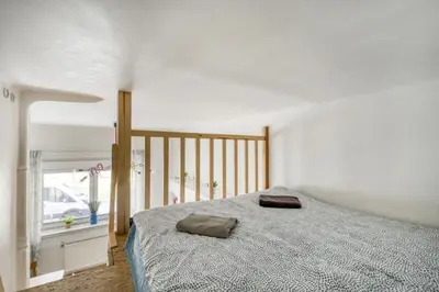 Łóżko lub łóżka w pokoju w obiekcie WSTApartments RetroFunky