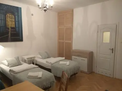 Łóżko lub łóżka w pokoju w obiekcie Studio Iwicka