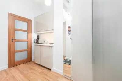 Kuchnia lub aneks kuchenny w obiekcie Nowy Świat Cozy Apartment Warsaw by Noclegi Renters