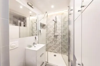 Łazienka w obiekcie Alma Apartments Grzybowska