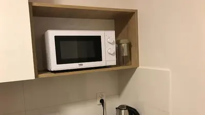 Kuchnia lub aneks kuchenny w obiekcie Apartament MetroMarymont