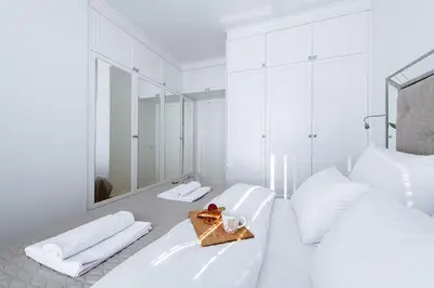Łóżko lub łóżka w pokoju w obiekcie P&O Apartments Aleja Krakowska