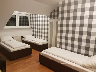Łóżko lub łóżka w pokoju w obiekcie Duszka Hostel
