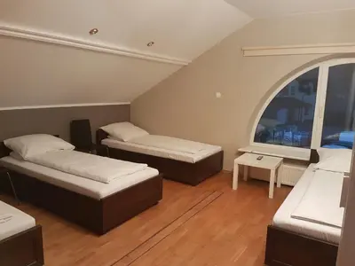 Łóżko lub łóżka w pokoju w obiekcie Duszka Hostel
