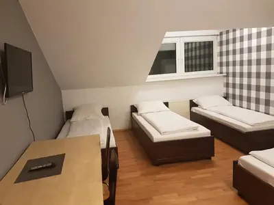 Telewizja i/lub zestaw kina domowego w obiekcie Duszka Hostel