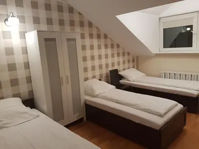 Łóżko lub łóżka w pokoju w obiekcie Duszka Hostel
