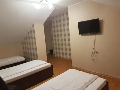 Telewizja i/lub zestaw kina domowego w obiekcie Duszka Hostel