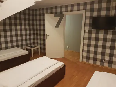 Łóżko lub łóżka w pokoju w obiekcie Duszka Hostel