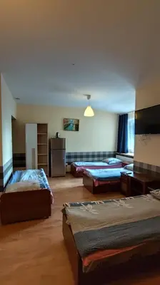 Łóżko lub łóżka w pokoju w obiekcie Henrix