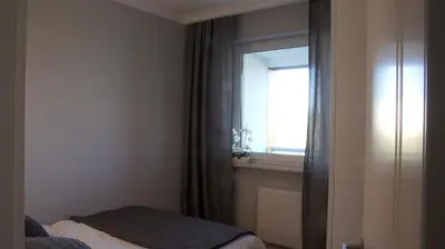 Łóżko lub łóżka w pokoju w obiekcie Apartamenty Grażyna Słodowiec