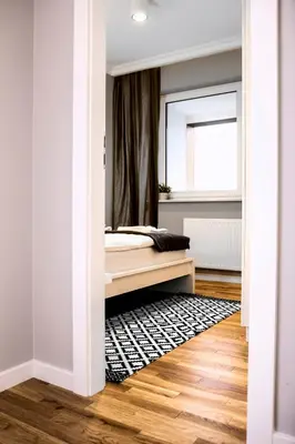 Łóżko lub łóżka w pokoju w obiekcie Apartamenty Grażyna Słodowiec