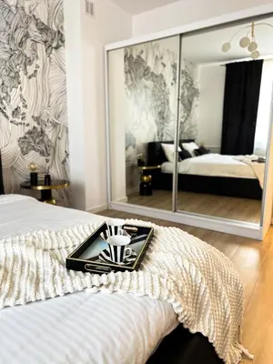 Łóżko lub łóżka w pokoju w obiekcie Apartament Plac Zbawiciela