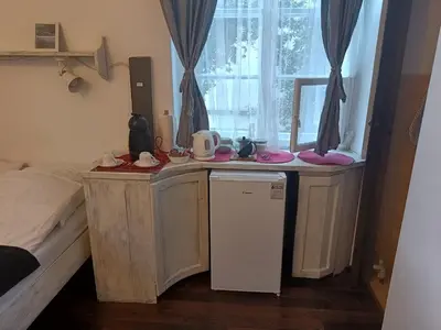 Łóżko lub łóżka w pokoju w obiekcie Studio Stare Miasto