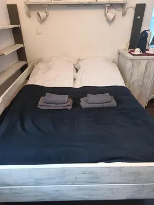 Łóżko lub łóżka w pokoju w obiekcie Studio Stare Miasto