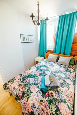 Łóżko lub łóżka w pokoju w obiekcie Bright 14th Flr Sunset City Park View by PolandBnB