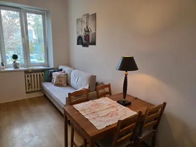 Łóżko lub łóżka w pokoju w obiekcie Augusta Apartment