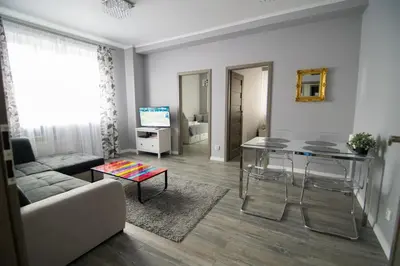 Telewizja i/lub zestaw kina domowego w obiekcie Bright Apartment Hoza