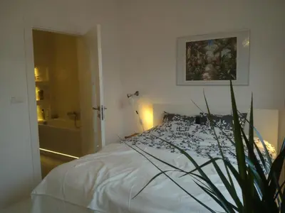 Łóżko lub łóżka w pokoju w obiekcie Luxury Apartment - Hoza 55