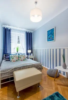 Łóżko lub łóżka w pokoju w obiekcie ClickTheFlat Apartment Chmielna 7
