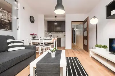 Telewizja i/lub zestaw kina domowego w obiekcie Apartments Dexter Warsaw by Noclegi Renters