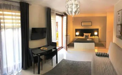 Łóżko lub łóżka w pokoju w obiekcie MOKO Apartment