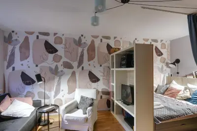 Łóżko lub łóżka w pokoju w obiekcie P&O Apartments Chomiczowka