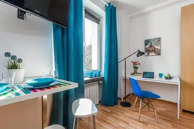 Telewizja i/lub zestaw kina domowego w obiekcie P&O Apartments Waszyngtona