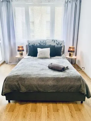 Łóżko lub łóżka w pokoju w obiekcie ClickTheFlat Royal Park Apart Rooms