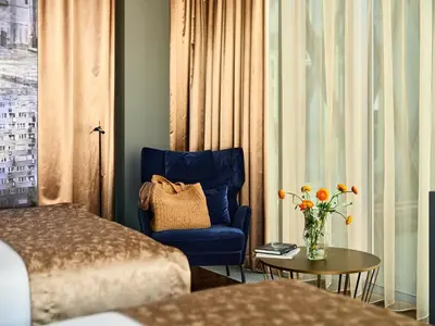 Łóżko lub łóżka w pokoju w obiekcie Hotel Indigo Warsaw Nowy Świat by IHG