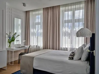 Łóżko lub łóżka w pokoju w obiekcie Hotel Indigo Warsaw Nowy Świat by IHG