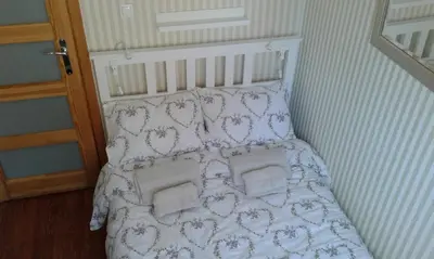 Łóżko lub łóżka w pokoju w obiekcie Marialoe