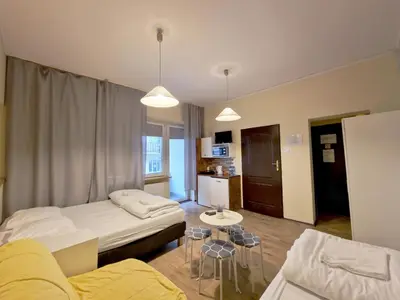 Łóżko lub łóżka w pokoju w obiekcie Hostel Helvetia - Private Rooms in City Center