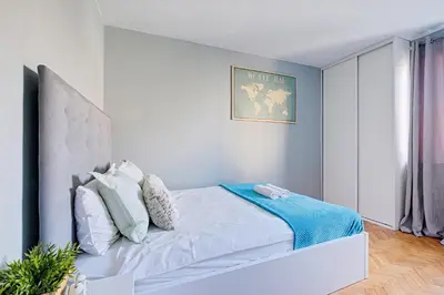 Łóżko lub łóżka w pokoju w obiekcie Little Home Apartments