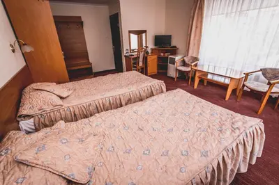Łóżko lub łóżka w pokoju w obiekcie Hotel Twins