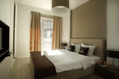 Łóżko lub łóżka w pokoju w obiekcie Platinum Residence