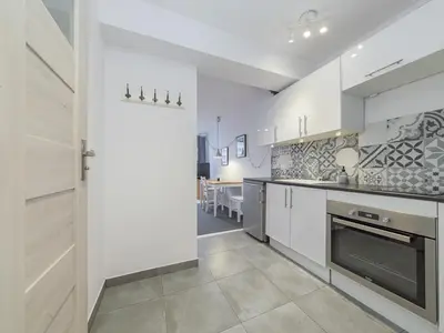 Kuchnia lub aneks kuchenny w obiekcie Sliska apartment Warsaw
