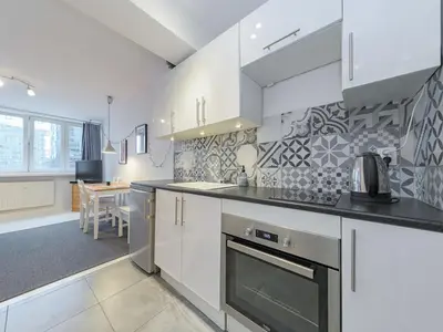 Kuchnia lub aneks kuchenny w obiekcie Sliska apartment Warsaw