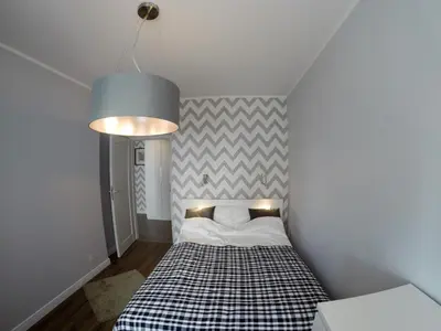 Łóżko lub łóżka w pokoju w obiekcie Apartament Garazowa 5