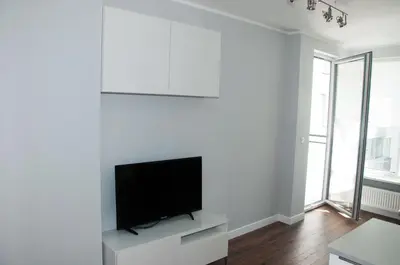 Telewizja i/lub zestaw kina domowego w obiekcie Apartament Garazowa 5