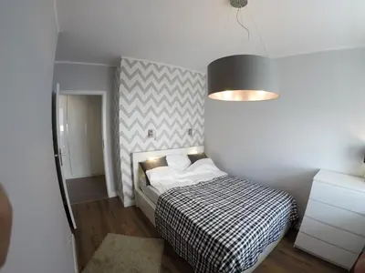 Łóżko lub łóżka w pokoju w obiekcie Apartament Garazowa 5