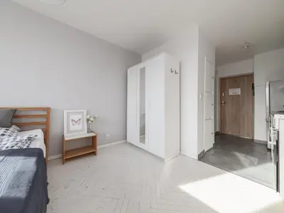 Łóżko lub łóżka w pokoju w obiekcie Bagno Cozy Studio