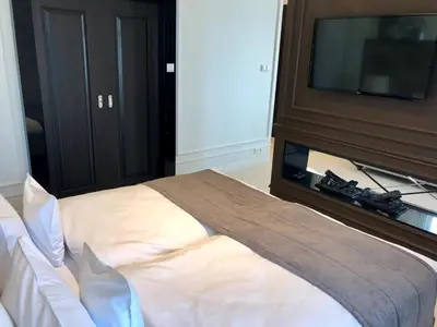 Łóżko lub łóżka w pokoju w obiekcie Hotel Mansor