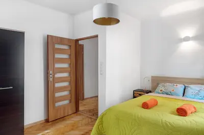 Łóżko lub łóżka w pokoju w obiekcie Evva & Peppe Old Town Flat