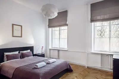 Łóżko lub łóżka w pokoju w obiekcie Bednarska Old Town Apartment