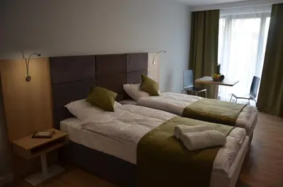 Łóżko lub łóżka w pokoju w obiekcie Apartamenty Oxygen DeLux