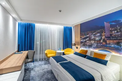 Łóżko lub łóżka w pokoju w obiekcie Golden Tulip Warsaw Airport