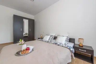 Łóżko lub łóżka w pokoju w obiekcie P&O Apartments Zawiszy