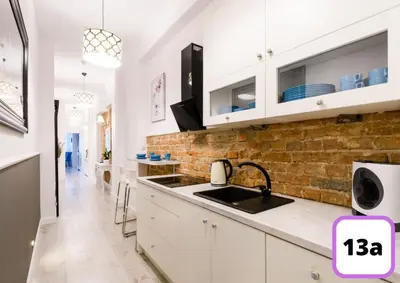 Kuchnia lub aneks kuchenny w obiekcie Sienna 41 Boutique Warsaw Apartments